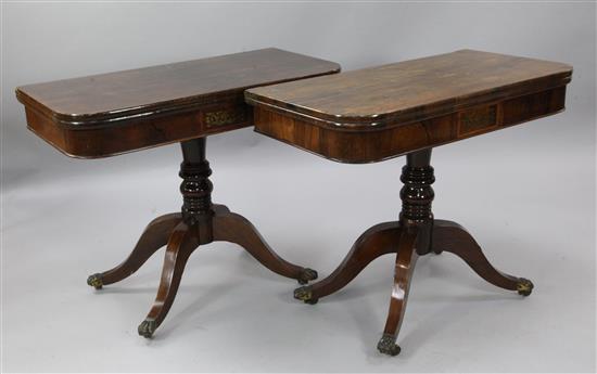 A pair of Regency rosewood card tables, W.2ft 11in. D.1ft 5.5in. H.2ft 4in.